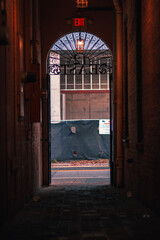 Vertical shot of an arched alleyway in Gainesville, Florida