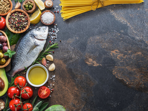 Fish, vegetables and pasta the main ingredients of Mediterranean cuisine. Lay out.