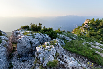 Monte Ortigara: Austro-Hungarian trenches and shelters of the Great War carved into the rock. In the background Cima della Caldiera. Asiago plateau, Vicenza province, Veneto, Italy, Europe.