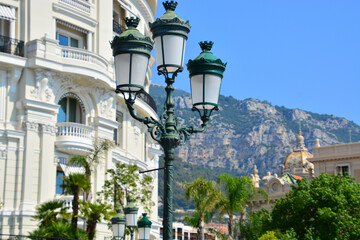 Lamp post on a street with historical buildings in Monte Carlo, Monaco