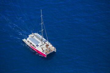 Fototapeta na wymiar Catamaran boat in Mayotte blue lagoon