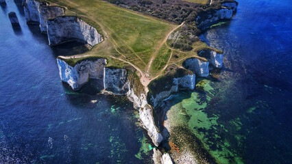 Bird's eye view of the Old Harry Rocks in bright sunlight in Isle of Purbeck, Dorset, England