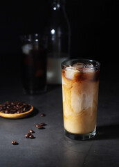 Cold coffee with ice in low key	