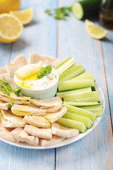 Tzatziki, Greek dip sauce with pita and cucumbers	