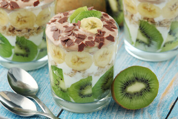Trifle desserts with bananas, kiwi and yogurt	