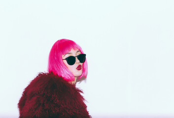Insanely beautiful rock girl in a hot pink wig and a red llama-style fur coat. Emotionally holds his head in his hands. hand gestures. Exclusive Flash style on a white background. - obrazy, fototapety, plakaty