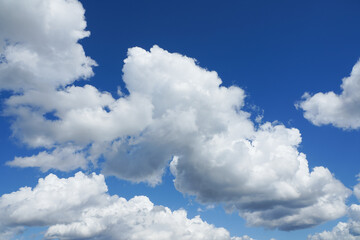prominent clouds with blue background. photo during the day.