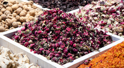 Pile of dried roses flowers tea close-up.