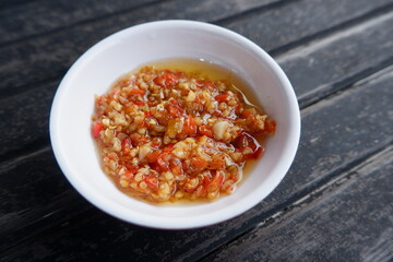 Sambal korek or Indonesian chili sauce or paste is usually made from a mixture of various chilies with additional ingredients such as shrimp paste, garlic, ginger, shallots and stir-fry