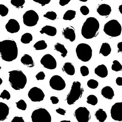 Vector black polka dots seamless pattern. Hand drawn points, blots, circles. Freehand drawing vector spots. Abstract monochrome background. Skin animal drawn. Simple messy blobs. Black paint ornament - obrazy, fototapety, plakaty