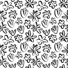 Abstract doodle pattern with floral motif. Herbal and daisy ink illustration. Vector doodle seamless pattern. Dry brush style floral motives. Black paint illustration with chamomiles and wild plants