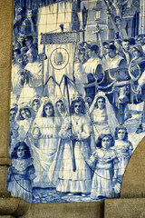 panels of azulejos represent the procession of Nossa Senhora dos Remédios in Lamego in the Sao Bento railway station, Porto, Portugal