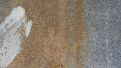 Grunge texture on a brown and dark gray background © Malekha/Wirestock Creators