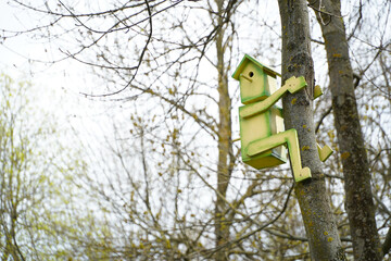 robot houses in a public park. bird houses. photo during the day.