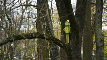robot houses in a public park. bird houses. photo during the day.