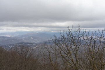 A mountain landscape with the sky and trees