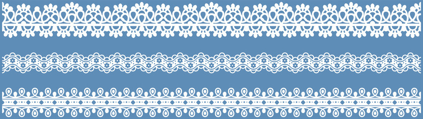 Set of wide lace ribbons with print. White design elements isolated on blue background. Seamless pattern for creating style of card with ornaments. Lace decoration template, ribbons for design