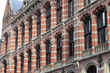 Amsterdam Spuistraat Street Historic Building Facade with Sculpted Details Close Up, Netherlands © Monica