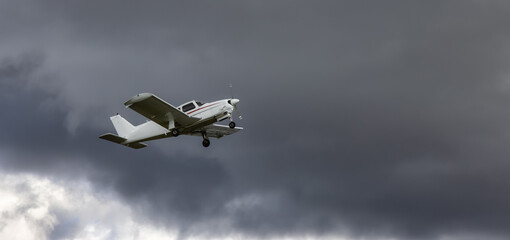 Single Engine Small Airplane taking off from an Airport.