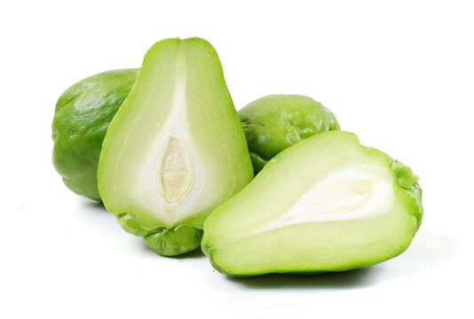 Closeup of fresh green chayote fruits isolated on a white background