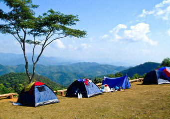 Adventure Camping and tent on the top of a mountain, Travel Concept in Thailand