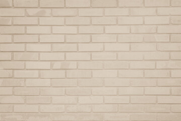 Fototapeta premium Cream white brick wall texture background. Brickwork interior design color beige bricks stack decoration.