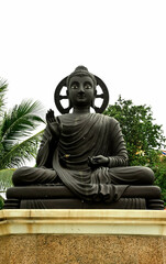  A Buddha in black sitting statue in Thailand