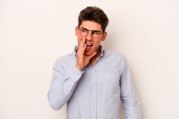 Young caucasian man isolated on white background shouting excited to front.