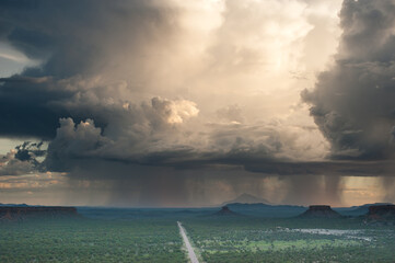 Naklejka na ściany i meble Thunderstorm with huge clouds in Namibia