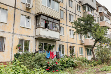 Fototapeta na wymiar View of Khrushchyovka, common type of old low-cost apartment building in Russia and post-Soviet space. Kind of prefabricated buildings. Built in 1960s. Russia, Vladivostok.