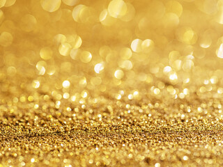 Sparkling golden powder. Festive background.