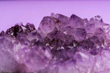 Fototapeta premium Crystal of amethyst close up for recreation and meditation. Crystals for esoteric practice.