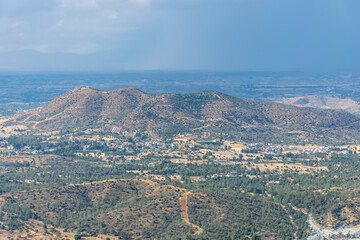 Obraz premium Beautiful view of the open spaces of the mountains of Cyprus with green trees