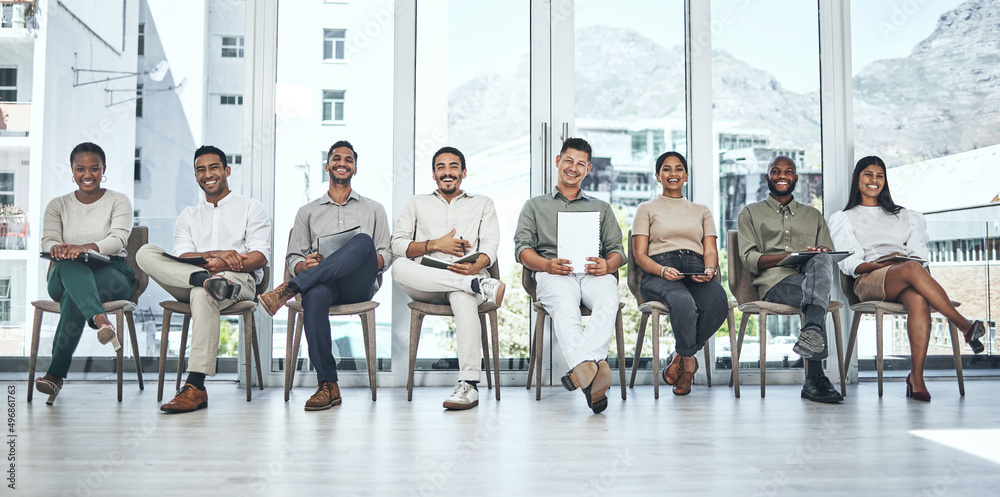 Poster equal opportunity for all. shot of a group of people waiting to be interviewed for a job at a modern