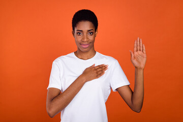 Photo of transgender lady hand gesture heart show oath promise sign wear trendy t-shirt isolated...