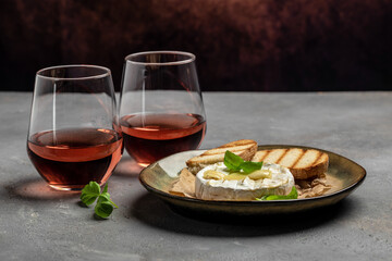 camembert cheese baked with with basil leaves and wine. banner, menu, recipe place for text, top view