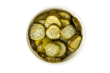 A bowl of marinated cucumbers on a  white background. Top view.
