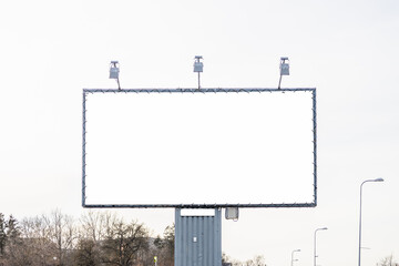 Obraz premium Mockup large white blank advertising billboard or promotion against the sky background