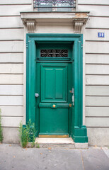 Fototapeta na wymiar Green door at number eleven