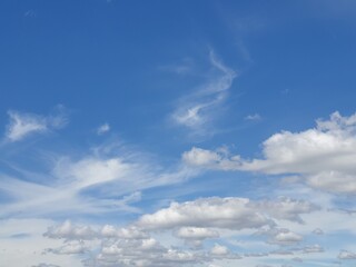 Obraz premium soft clouds and azure sky background.The atmosphere in the blue sky with copy space .The weather is clear today. meteorology