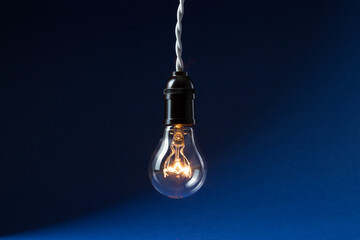 Closeup of a new generation led light bulb on a blue background