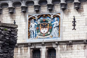 Fotobehang Closeup of the details of Het Steen's facade, a medieval fortress in Antwerp, Belgium © Alexandre Fagundes/Wirestock Creators