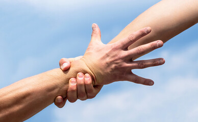 Helping hands concept, support. Close up help arm and international day of peace, support. Hands of...