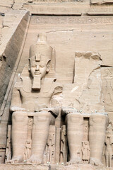 One of the monumental statues at the front of the Great Temple of Ramses II, Abu Simbel Egypt
