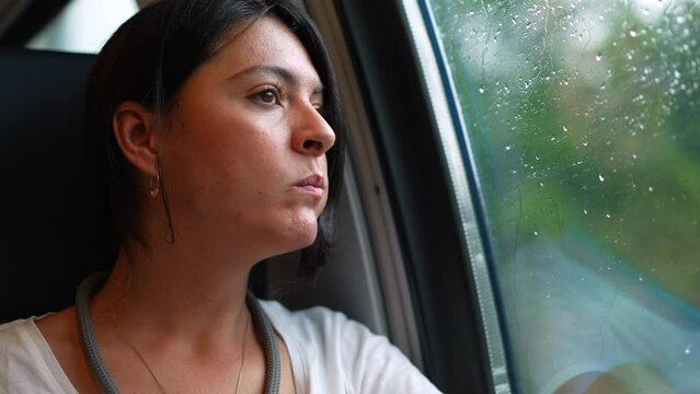 Passenger woman eating cookie while traveling on comute