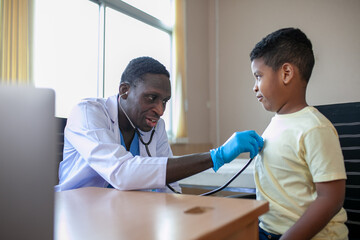 African pediatrician hold stethoscope examining child boy patient.