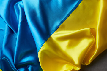 Ukrainian national flag colors on beton background. Yellow and blue colors. Ukraine nation independence celebration symbol