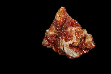 Macro mineral stone Vanadinite on a black background