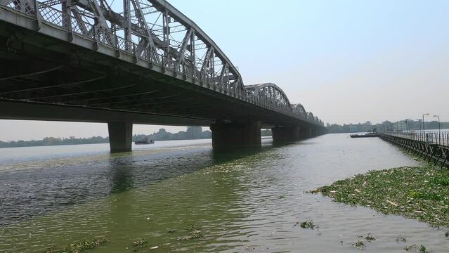 Vivekananda Setu bridge over the Hooghly River in West Bengal, India links the city of Howrah, at Bally, to Kolkata, at Dakshineswar.