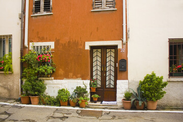 Fototapeta na wymiar Cozy old building in Old Town of Rimini, Italy